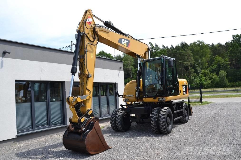 CAT M 315 D  휠 굴삭기