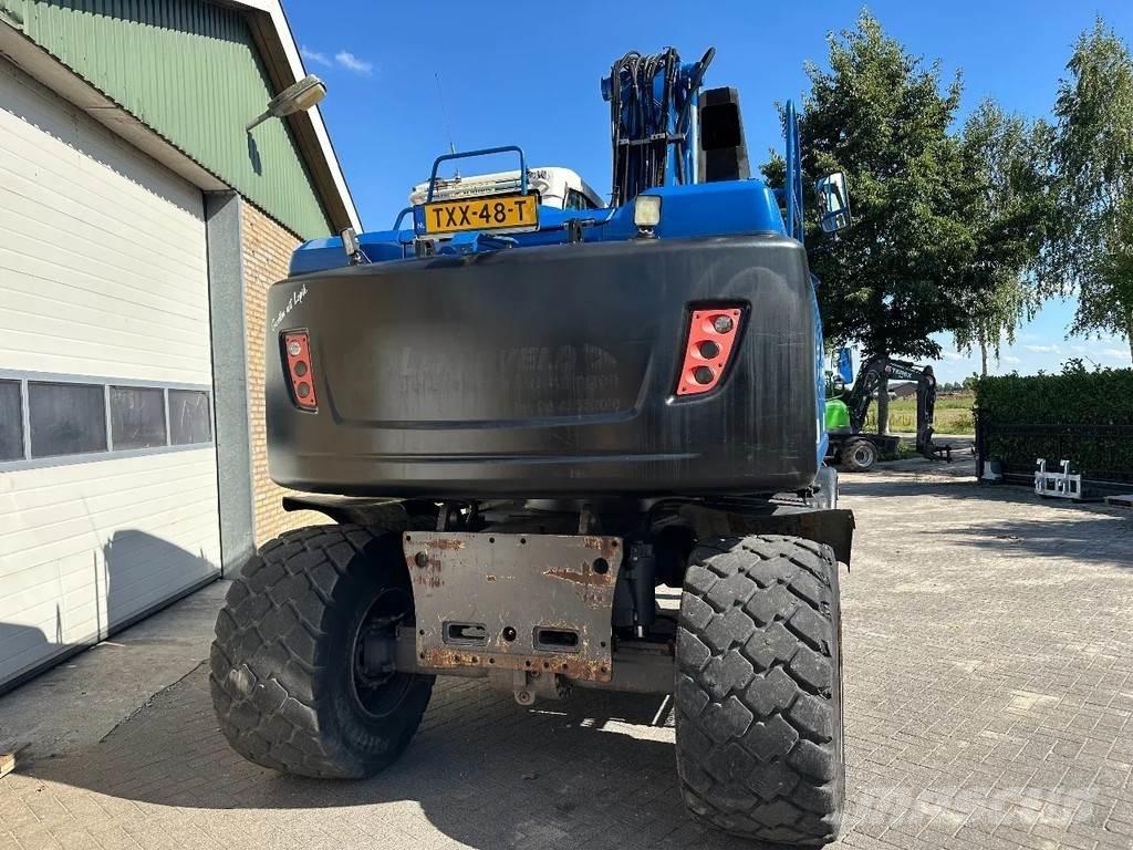 Volvo EW140D  휠 굴삭기
