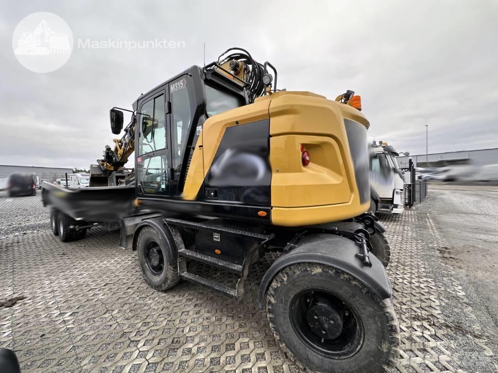 CAT M 315  휠 굴삭기