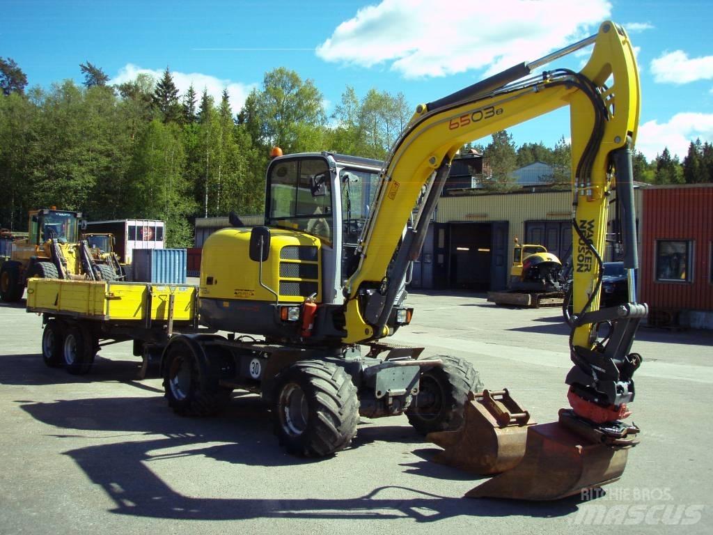 Neuson 6503-2 30Km/h  휠 굴삭기