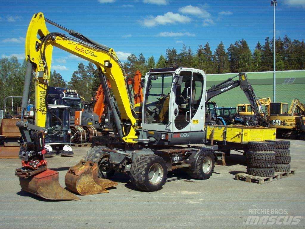 Neuson 6503-2 30Km/h  휠 굴삭기