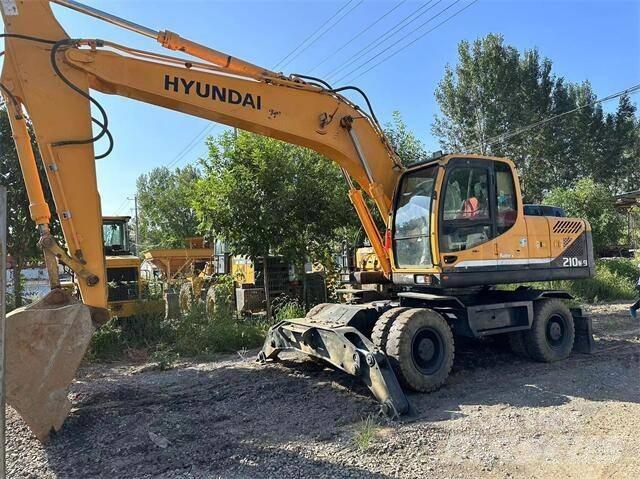 Hyundai 210W  휠 굴삭기