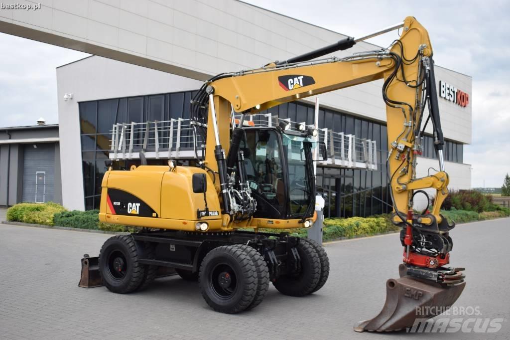 CAT M 313 D  휠 굴삭기