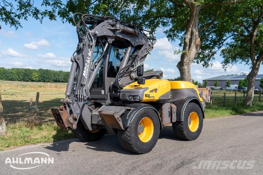 Mecalac 12 MTX  휠 굴삭기