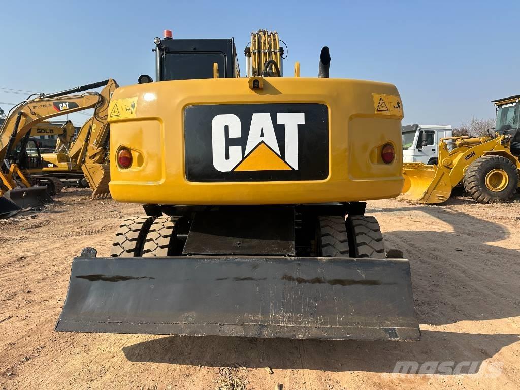 CAT M 320D  휠 굴삭기