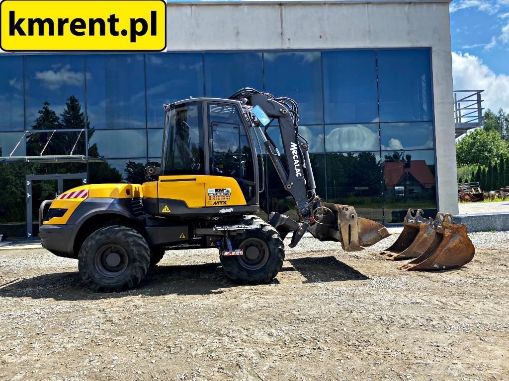 Mecalac 12 M TX 백호로더
