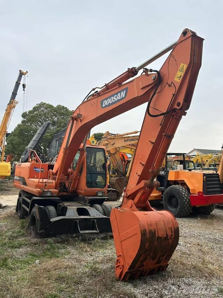 Doosan DH 210 W  휠 굴삭기