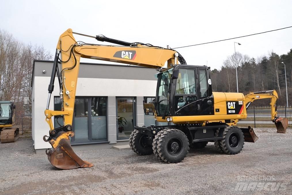 CAT M 315 D  휠 굴삭기