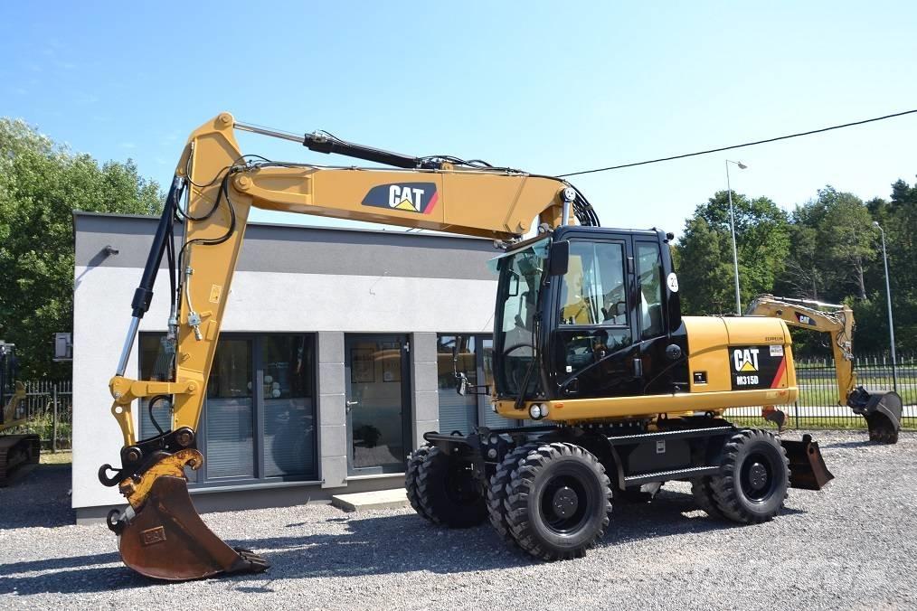 CAT M 315 D  휠 굴삭기