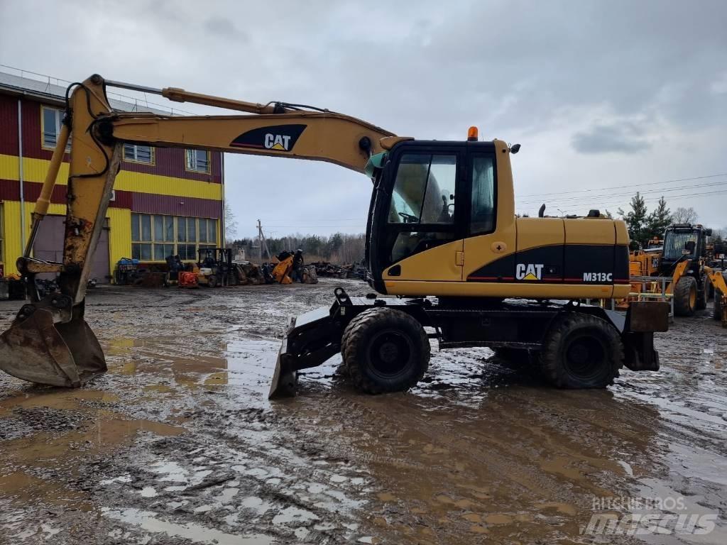 CAT M 313 C  휠 굴삭기