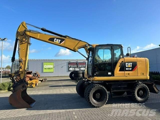 CAT M 314 F  휠 굴삭기