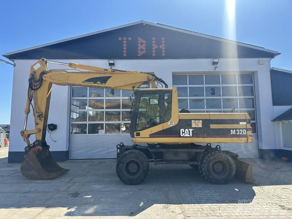 CAT M 320 VAH  휠 굴삭기