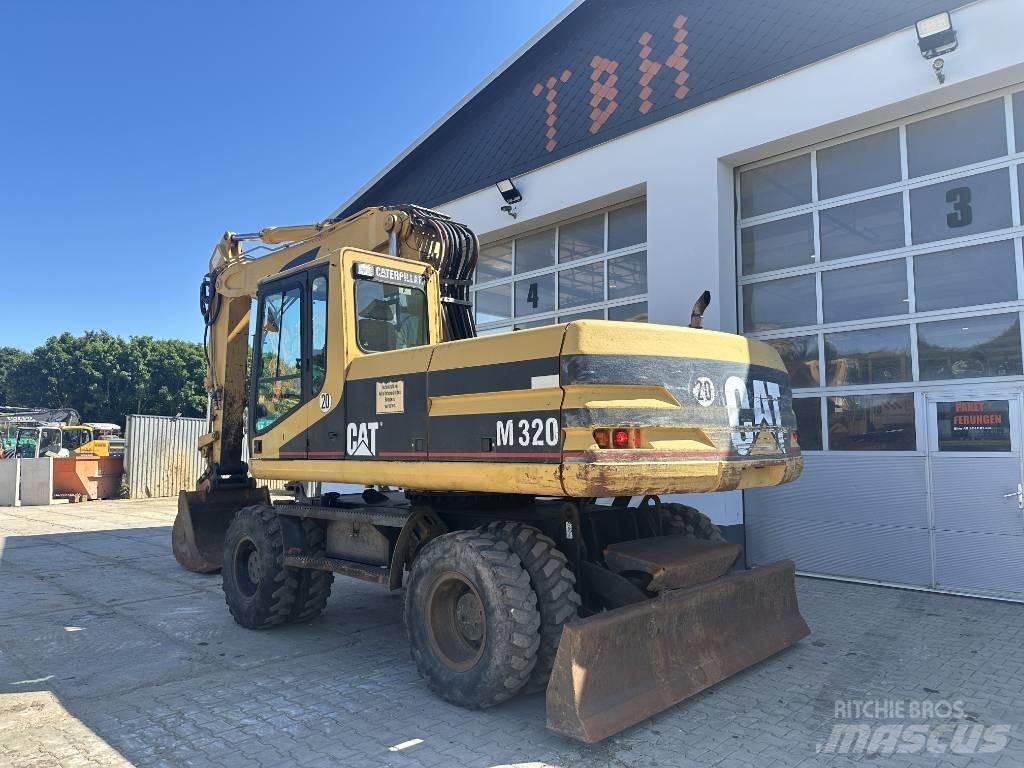 CAT M 320 VAH  휠 굴삭기