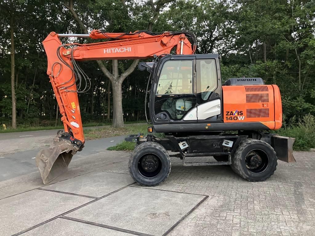 Hitachi ZX140-5B  휠 굴삭기