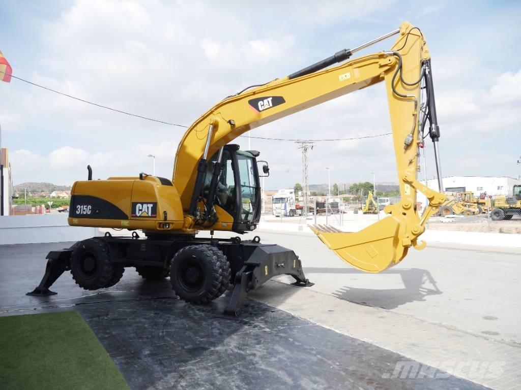 CAT M 315 C  휠 굴삭기