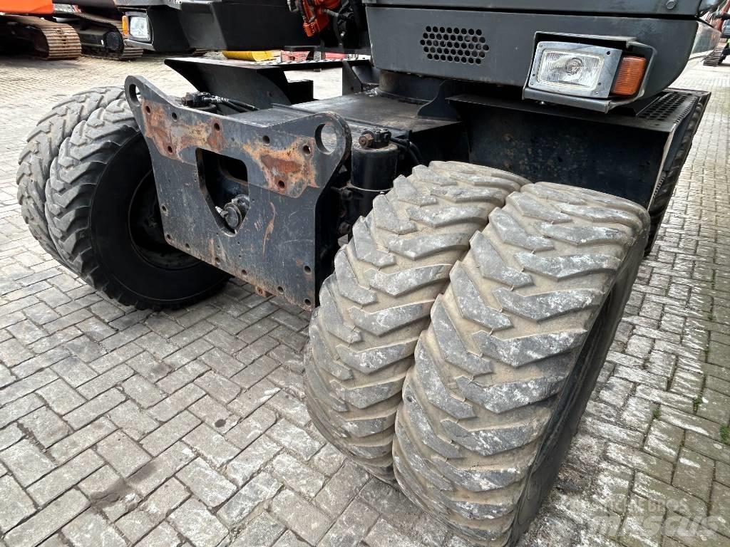 Hitachi ZX 140 W  휠 굴삭기