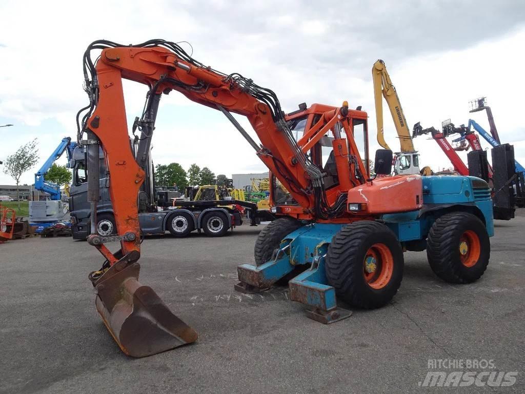 Mecalac 12MXT  휠 굴삭기