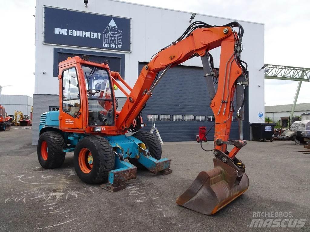 Mecalac 12MXT  휠 굴삭기
