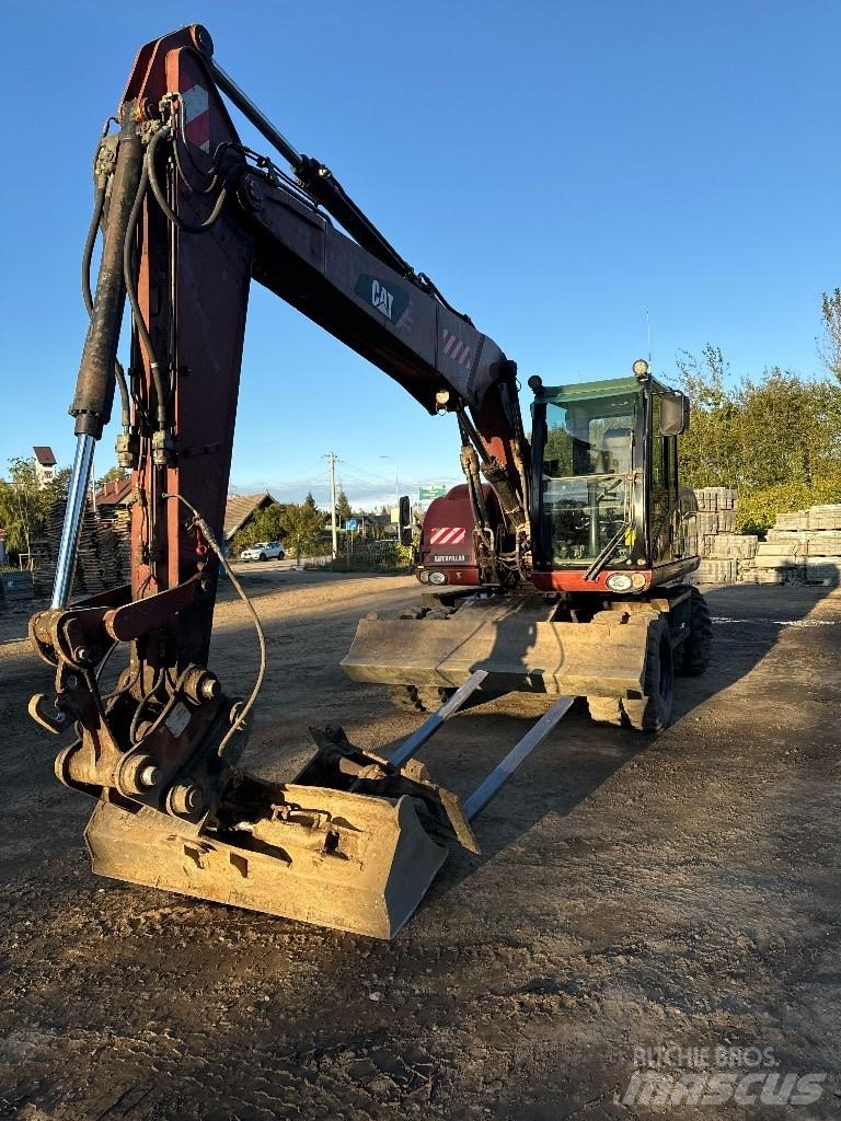 CAT 313 D  휠 굴삭기