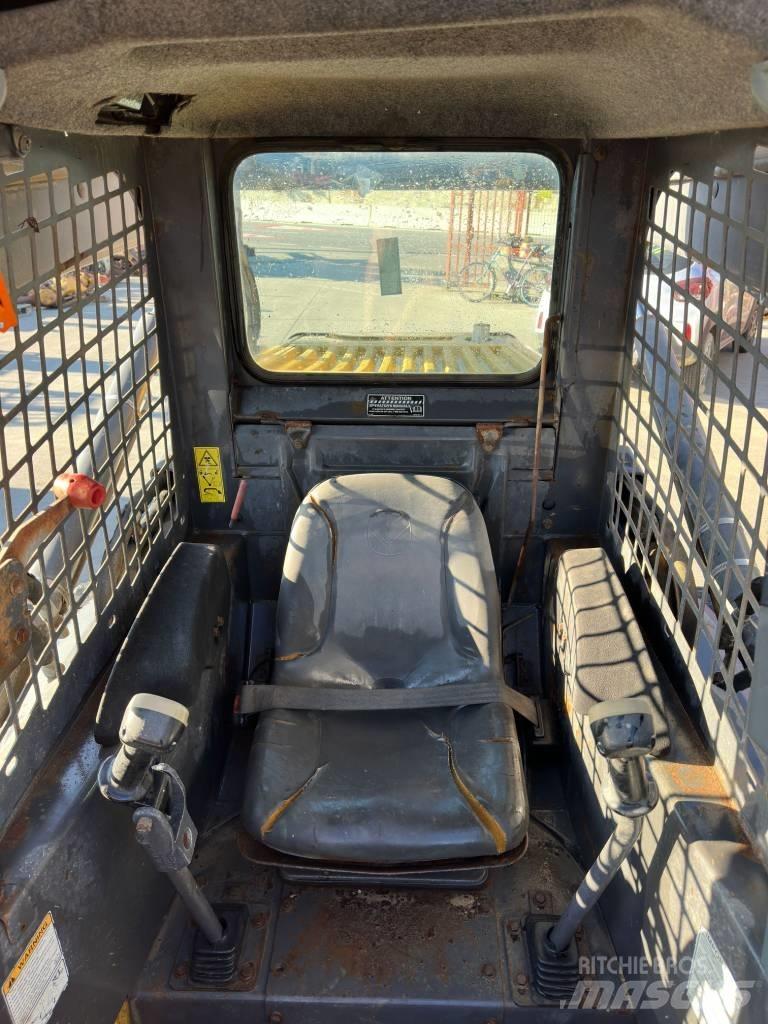 New Holland C 185  스키드로더