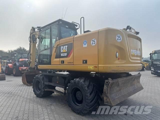 CAT M 320 F  휠 굴삭기
