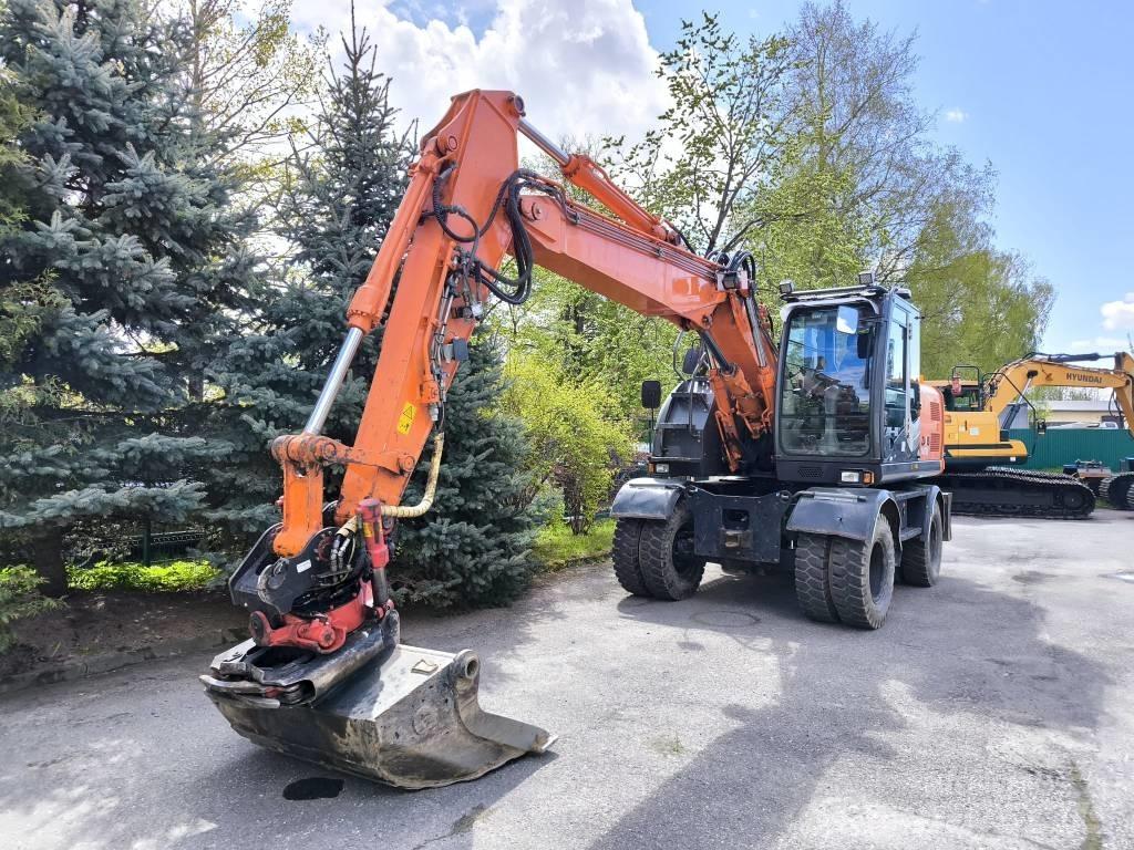 Hitachi ZX 140 W-3  휠 굴삭기