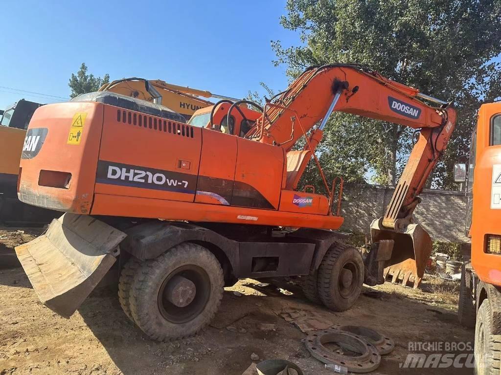Doosan DH210w  휠 굴삭기