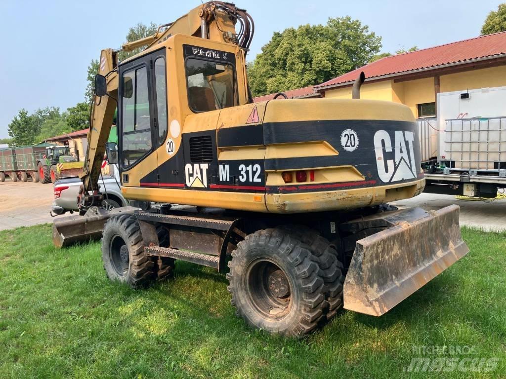 CAT M 312  휠 굴삭기