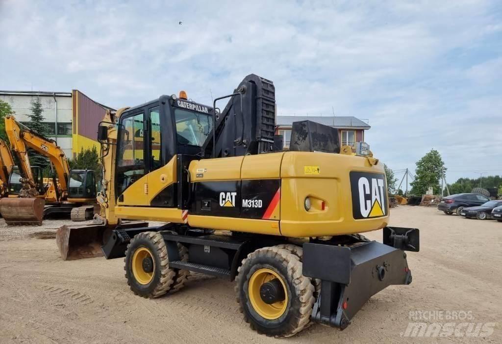 CAT M313 D  휠 굴삭기