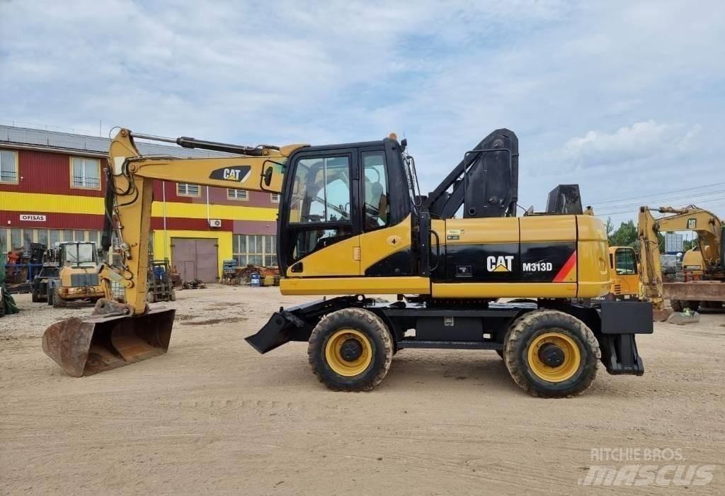 CAT M313 D  휠 굴삭기
