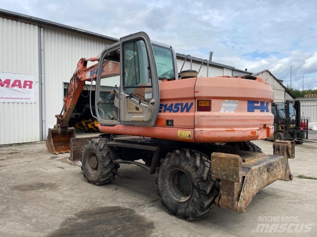 Kobelco E145W  휠 굴삭기