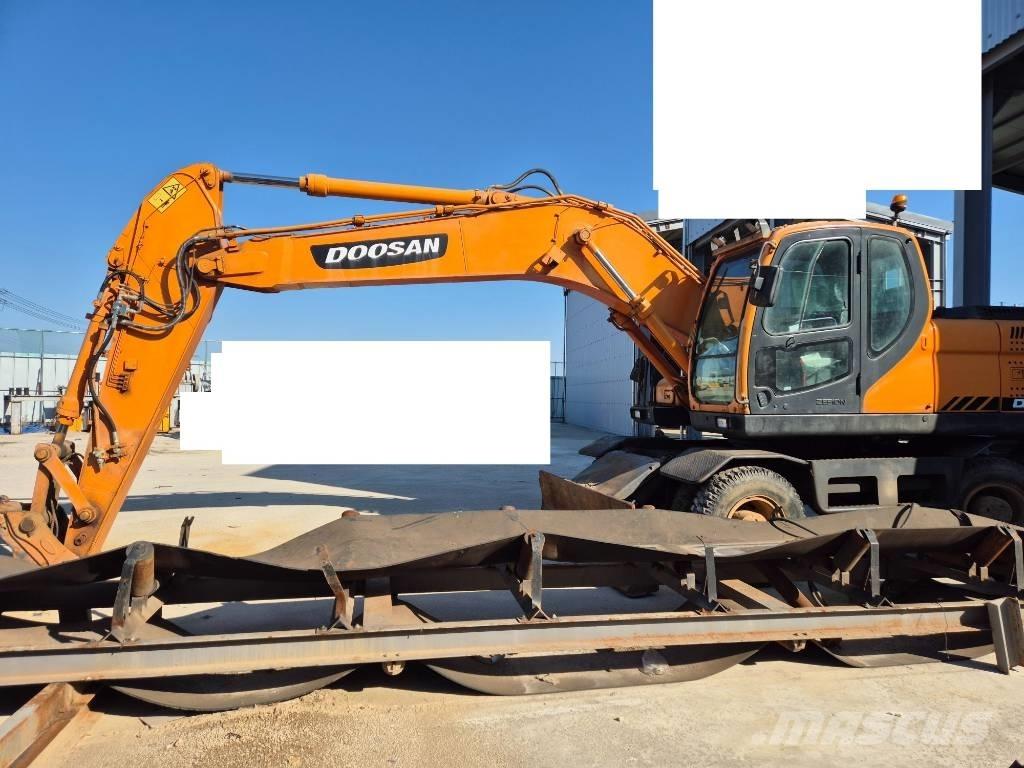Doosan DX 210 W  휠 굴삭기