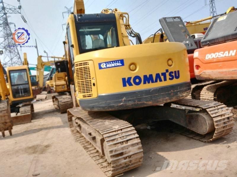 Komatsu PC 128 US-8 중형굴삭기 7톤-28톤