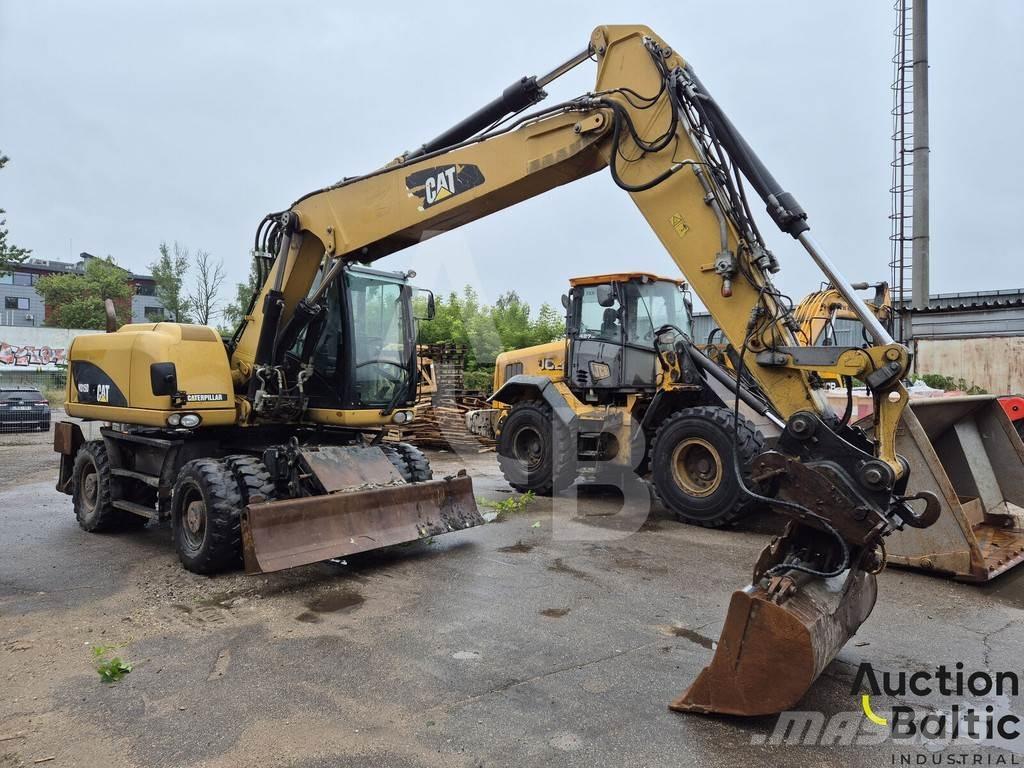 CAT M 315 D  휠 굴삭기