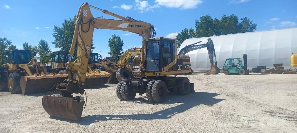 CAT M 315  휠 굴삭기