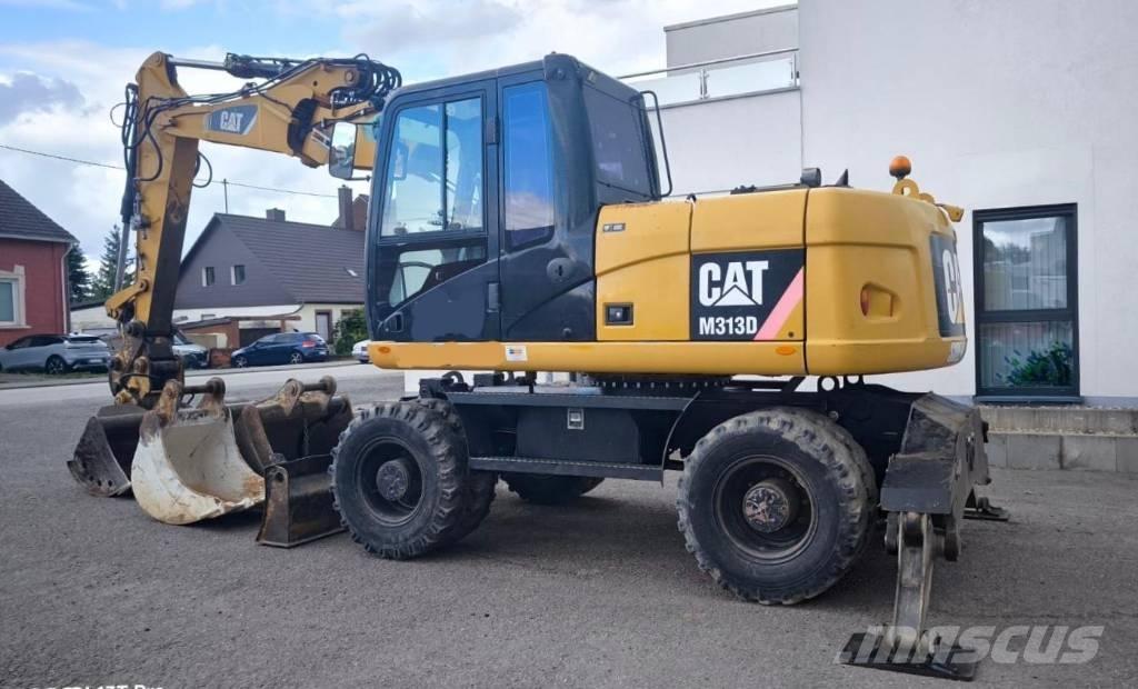 CAT M 313 D  휠 굴삭기