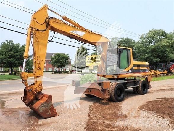 CAT M320  휠 굴삭기