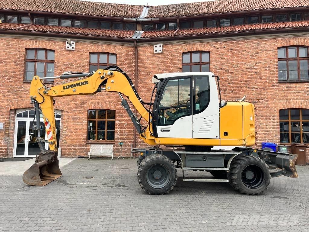 Liebherr A 910 Comp  휠 굴삭기