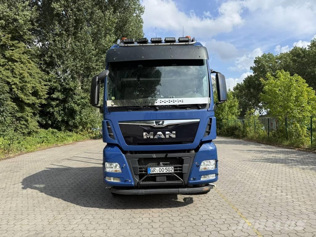 MAN TGX 33.500 산림 기계 운반 트럭