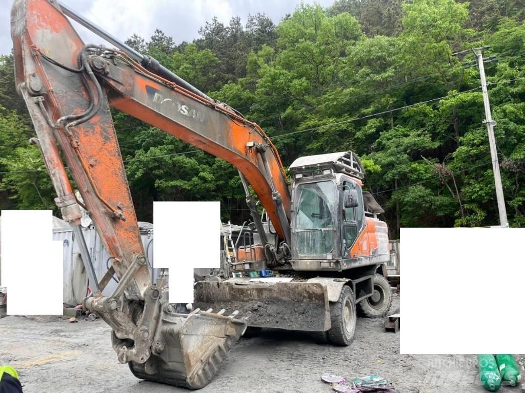 Doosan DX 210 W  휠 굴삭기