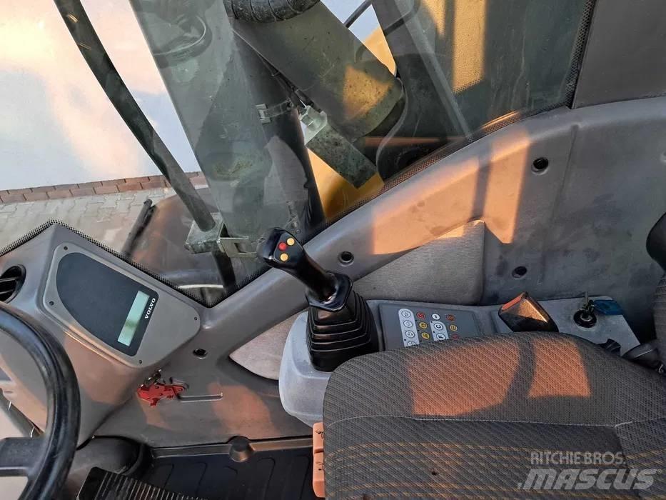 Volvo EW 140  휠 굴삭기