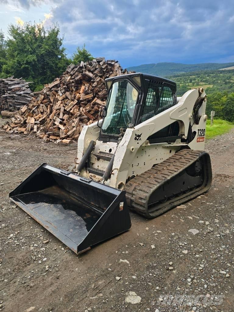 Bobcat T 320  스키드로더