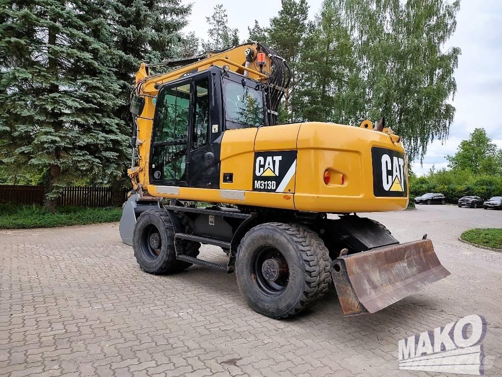 CAT M 313 D  휠 굴삭기