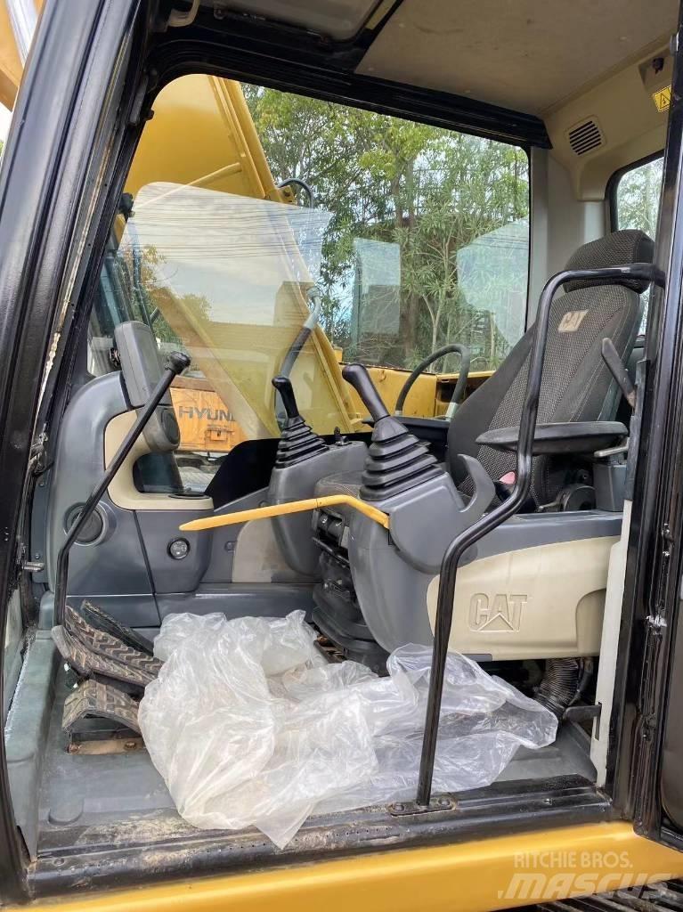 CAT 313 D  휠 굴삭기