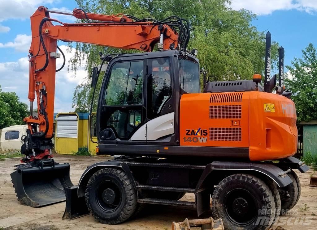 Hitachi 140W  휠 굴삭기