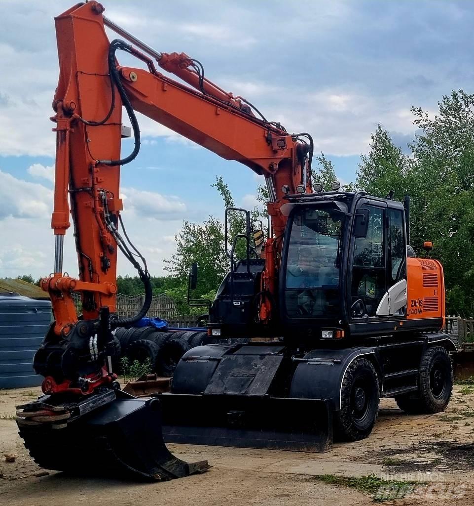 Hitachi 140W  휠 굴삭기