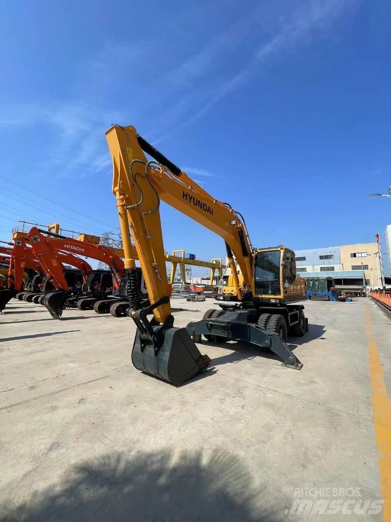 Hyundai 210W-9  휠 굴삭기