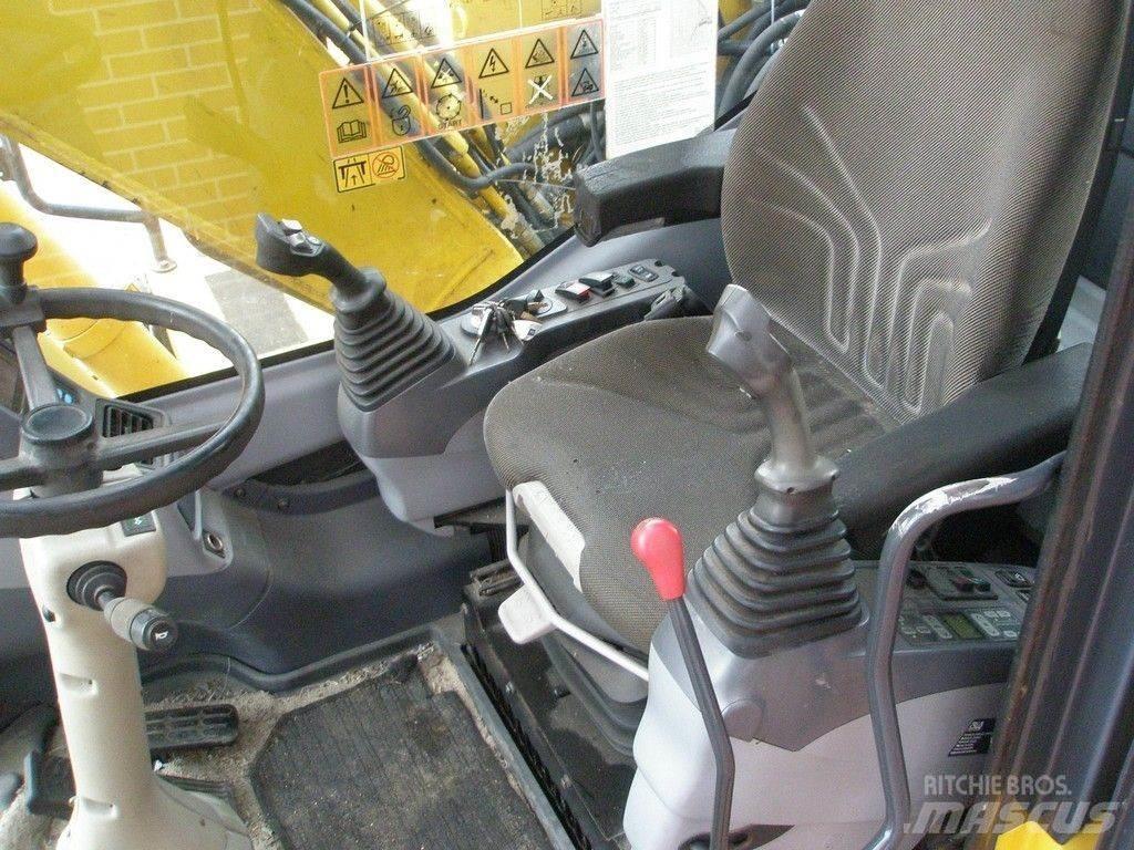 Komatsu PW140-7  휠 굴삭기
