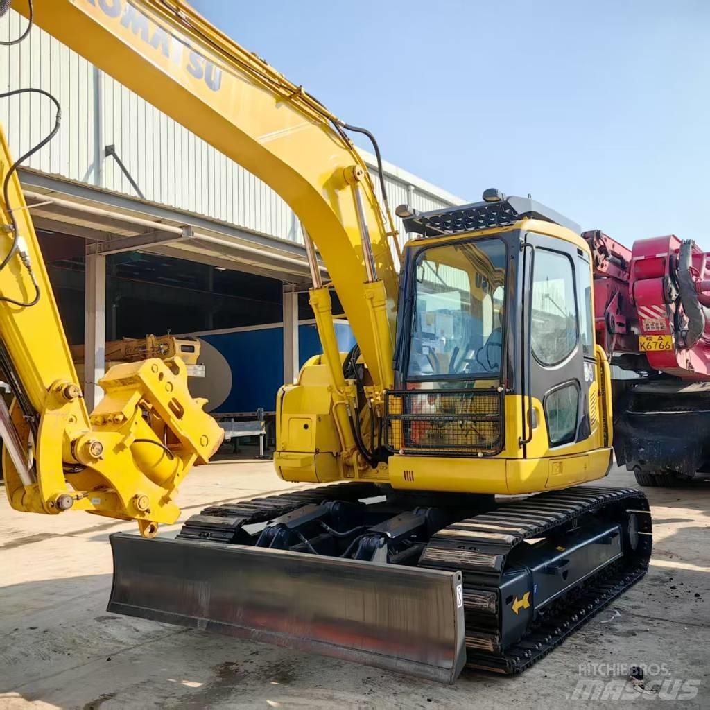 Komatsu PC 128 US 중형굴삭기 7톤-28톤