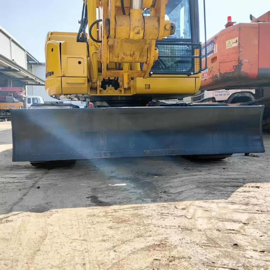 Komatsu PC 128 US 중형굴삭기 7톤-28톤